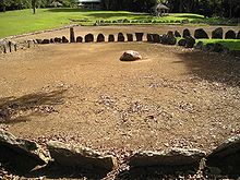 Caguana Ceremonial ball court (batey), outlined with stones. By Alessandro Cai (OliverZena) (Own work) [Public domain], via Wikimedia Commons